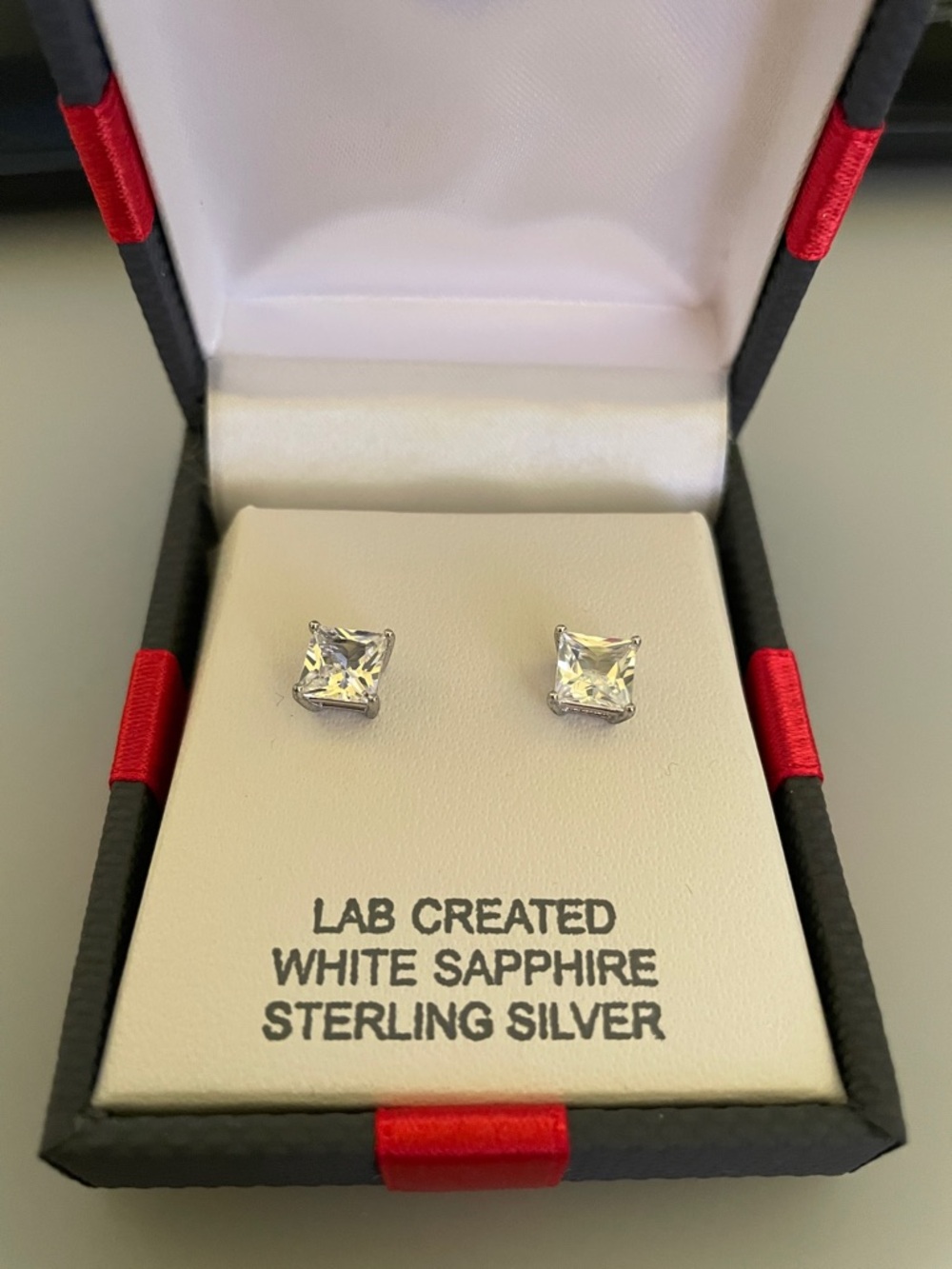 NIB JCPenny’s Sterling Silver White Sapphire Stud Earrings - Lab Created